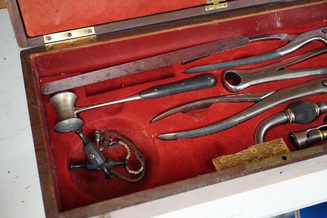 A 19th century surgeon’s set by Collin & Cil., Paris, in a fitted mahogany case, comprising of steel surgeons instruments; knives, scalpels, scoops, tourniquet, saws, rasps, some instruments stamped with maker’s name, wi